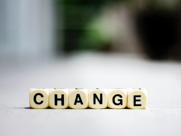 These are dice spelling the word "Change".