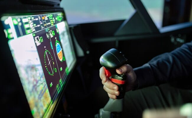 This is a person going through a pilot simulation.